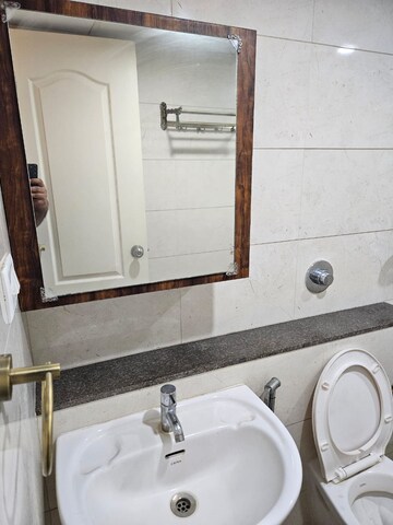 Bathroom in 3 BHK Apartment at Goyal Orchid Piccadilly, Thanisandra Main Road – for Rent