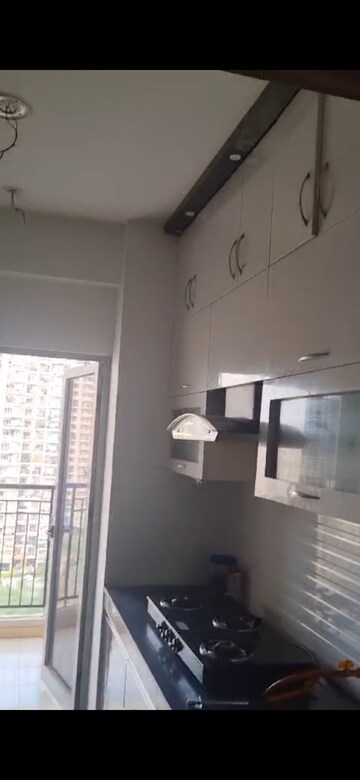 Kitchen in 2 BHK Apartment at Gulshan Bellina, Sector 16 Greater Noida – for Rent