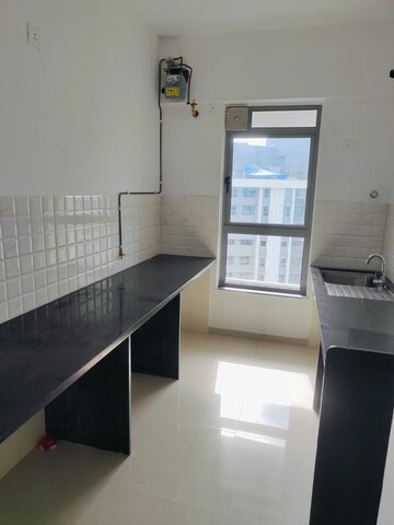 Kitchen in 2 BHK Apartment at Kalpataru Immensa, Kolshet Road – for Rent