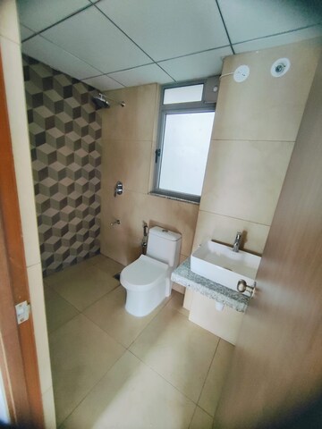 Bathroom in 2 BHK Apartment at Kalpataru Immensa, Kolshet Road – for Rent