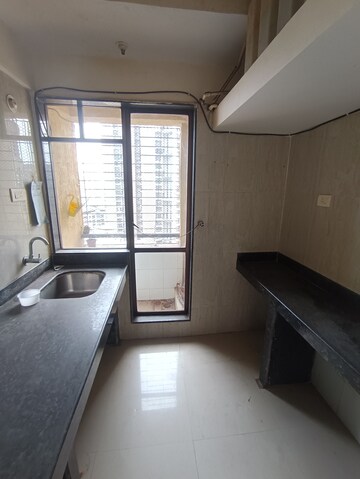 Kitchen in 2 BHK Apartment at Ajmera Yogi Dham Phase III, Kalyan West – for Sale