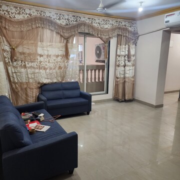 Living Room in 2 BHK Apartment at Fairmont Reyhaan Terraces, Khan Estate – for Rent
