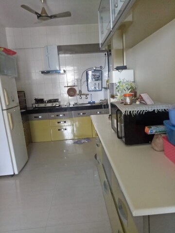 Kitchen in 3 BHK Apartment at Darode Jog Crossover County, Sinhagad Road – for Sale