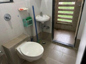 Bathroom in 1 BHK Apartment at Cosmos Orchid, Ghodbunder Road – for Sale