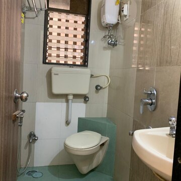 Bathroom in 2 BHK Apartment at Krishna Classic, Babhai Naka – for Rent