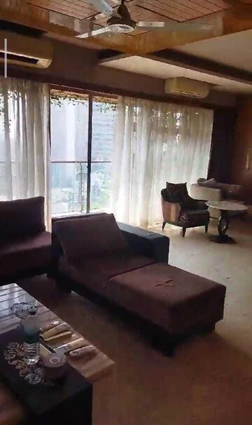 Living Room in 4 BHK Apartment at Infinite Poorna Apartments, Andheri West – for Rent