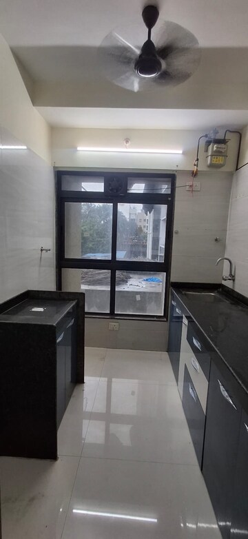 Kitchen in 2 BHK Apartment at DGS Sheetal Dharmaraj, Malad West – for Rent