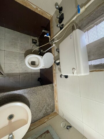 Bathroom in 2 BHK Apartment at Evershine Woods, Mira Road – for Rent