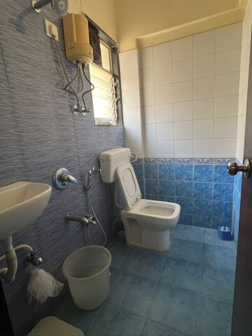 Bathroom in 1 BHK Apartment at Dheeraj Valley, Goregaon East – for Rent