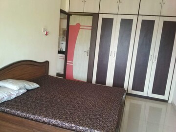 Bedroom in 1 BHK Apartment at Satellite Garden, Goregaon East – for Rent