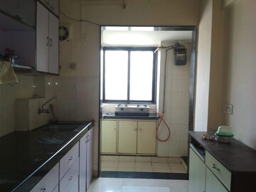 Kitchen in 1 BHK Apartment at Satellite Garden, Goregaon East – for Rent
