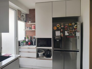 Kitchen in 3 BHK Apartment at ABA Cleo County, Sector 121 – for Rent