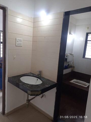 Bathroom in 3 BHK Apartment at Shree Ganesh Sentosa Elysium, Wakad – for Rent