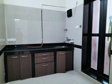 Kitchen in 1 BHK Apartment at K Raheja Raheja Residency, Malad East – for Rent