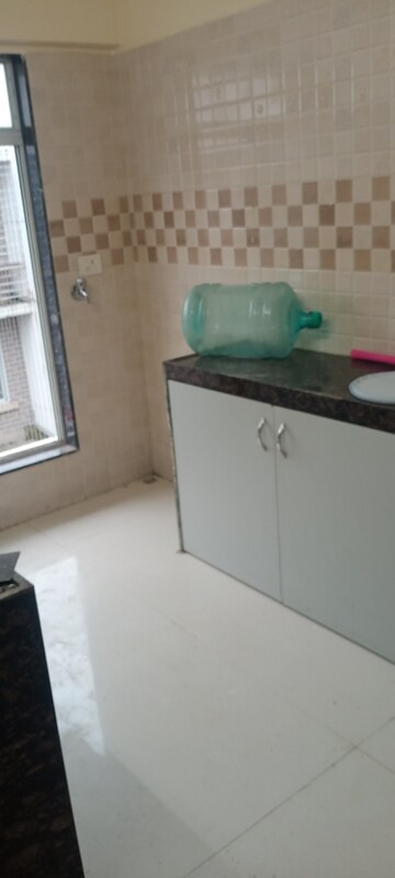 Bathroom in 1 BHK Apartment at Bindra Complex, Andheri East – for Rent