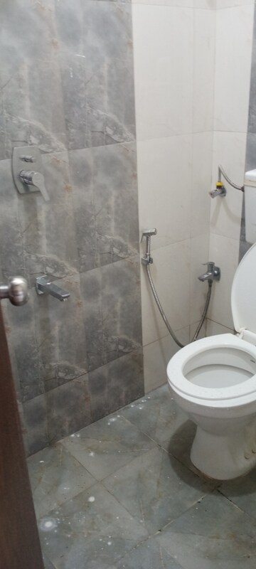 Bathroom in 1 BHK Apartment at Bindra Complex, Andheri East – for Rent