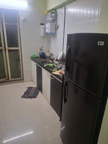 Kitchen in 3 BHK Apartment at Bindra Complex, Andheri East – for Rent