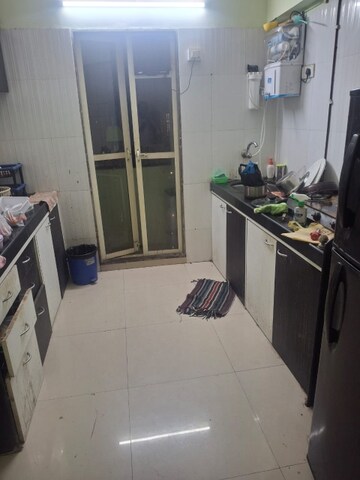 Kitchen in 3 BHK Apartment at Bindra Complex, Andheri East – for Rent