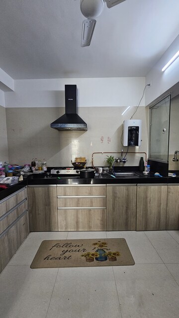 Kitchen in 2 BHK Apartment at Shree Venkatesh Graffiti Glover, Keshav Nagar – for Rent