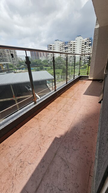 Balcony in 2 BHK Apartment at Shree Venkatesh Graffiti Glover, Keshav Nagar – for Rent