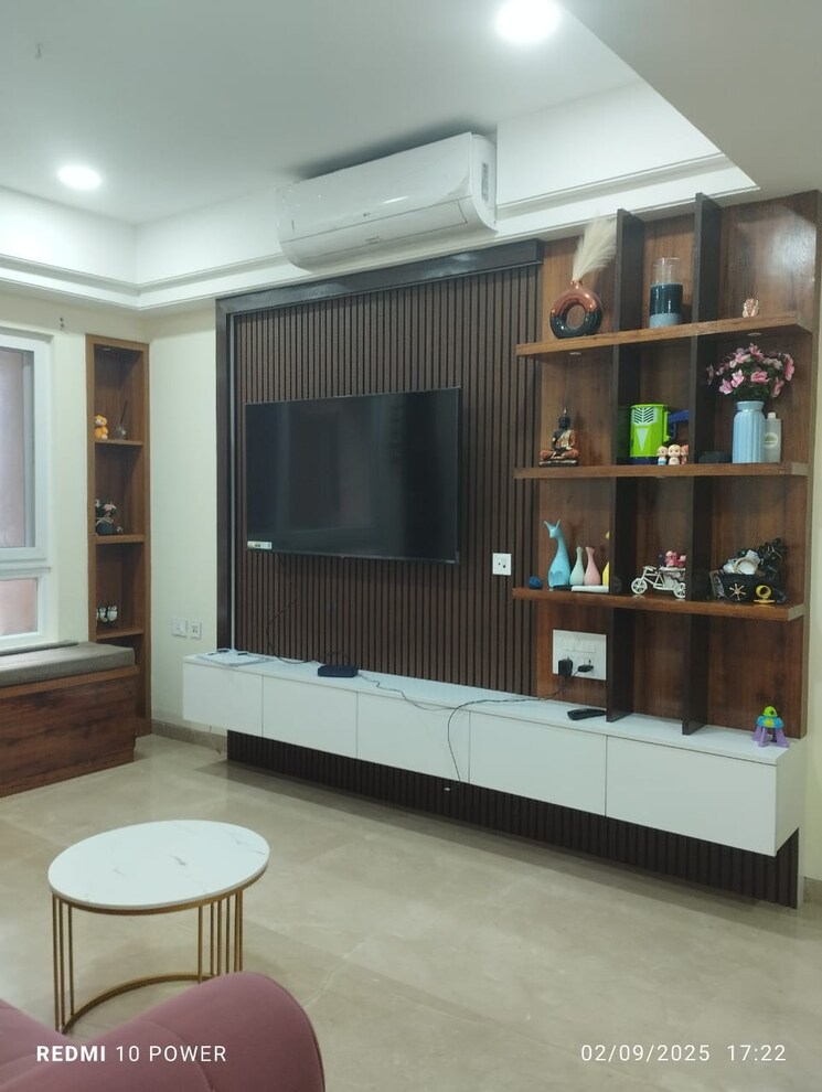 Living Room, universal-botanika-tower-a-and-b 3 Bedroom 2400 Sq.Ft. Apartment In Gachibowli Hyderabad 9147986