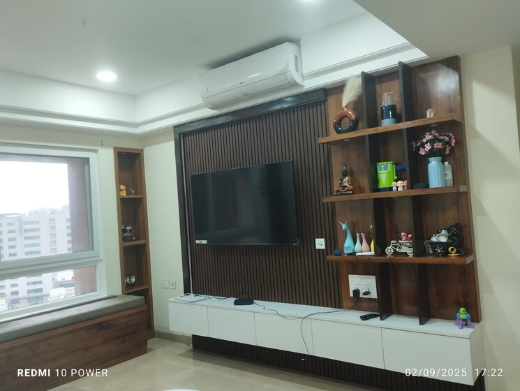 Living Room, universal-botanika-tower-a-and-b 3 Bedroom 2400 Sq.Ft. Apartment In Gachibowli Hyderabad 9147986