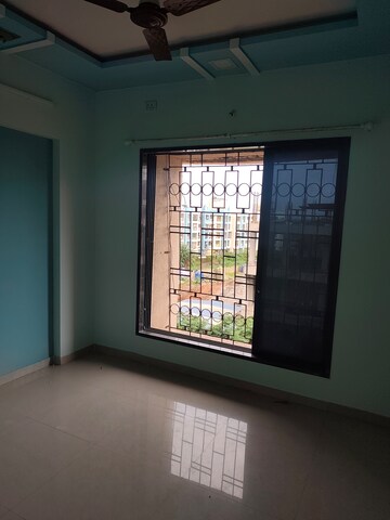 Bedroom in 2 BHK Apartment at Agarwal Vrindavan Gardens, Nalasopara East – for Rent