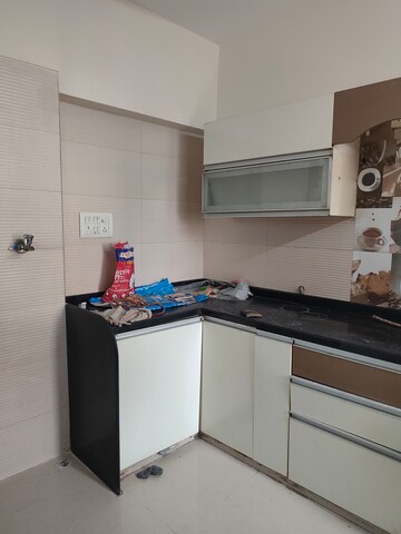 Kitchen in 2 BHK Apartment at Agarwal Vrindavan Gardens, Nalasopara East – for Rent