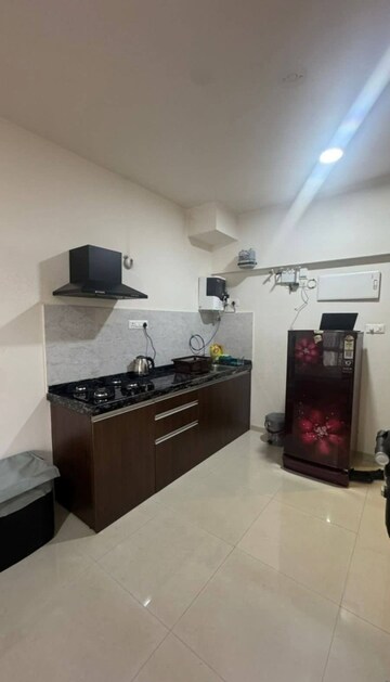 Kitchen in 1 RK Apartment at Gera World of Joy, Kharadi – for Rent