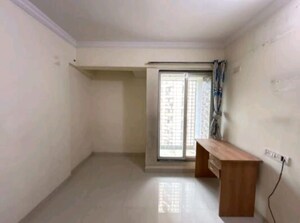 Living Room in 1 BHK Apartment at Cosmos Orchid, Ghodbunder Road – for Sale