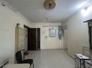 Living Room in 1 BHK Apartment at Cosmos Orchid, Ghodbunder Road – for Sale