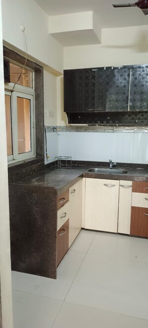 Kitchen in 2 BHK Apartment at Siddhi Highland Park Phase 2, Kapur Bawdi – for Sale