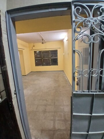 Staircase in 1 RK Apartment at Nagari Niwara CHS, Goregaon East – for Rent