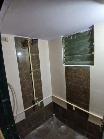 Bathroom in 1 RK Apartment at Nagari Niwara CHS, Goregaon East – for Rent