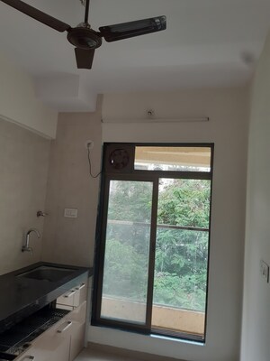 Kitchen in 3 BHK Apartment at Rajdeep Society, Naupada – for Sale