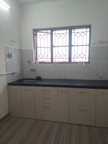 Kitchen in 1 BHK Apartment at Naiknavare Gardenia Society Phase 1, Wadgaon Sheri – for Rent