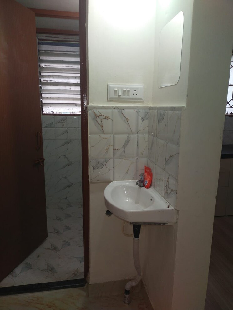 Bathroom, naiknavare-gardenia-society-phase-1 1 Bedroom 500 Sq.Ft. Apartment In Wadgaon Sheri Pune 9148317