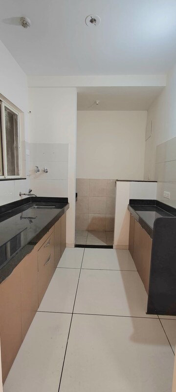 Kitchen in 2 BHK Apartment at Vilas Javdekar Yashwin Encore, Wakad – for Rent