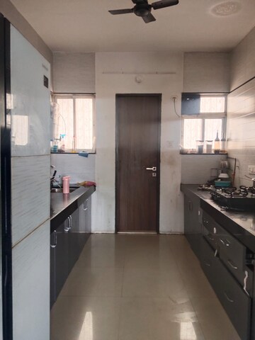 Kitchen in 2 BHK Apartment at Goel Ganga Liviano, Kharadi – for Sale