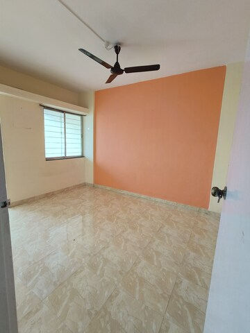 Bedroom in 1 BHK Apartment at Punyadham Society, Wadgaon Sheri – for Rent