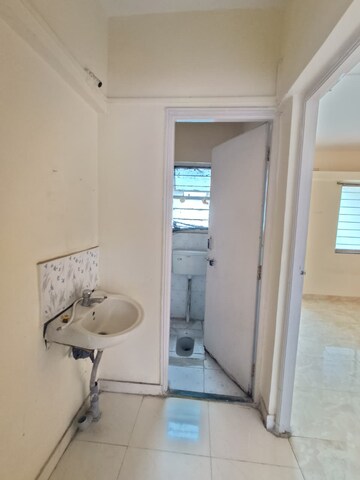 Bathroom in 1 BHK Apartment at Punyadham Society, Wadgaon Sheri – for Rent