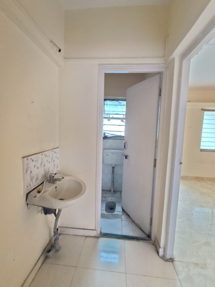 Bathroom, punyadham-society 1 Bedroom 634 Sq.Ft. Apartment In Wadgaon Sheri Pune 9148330