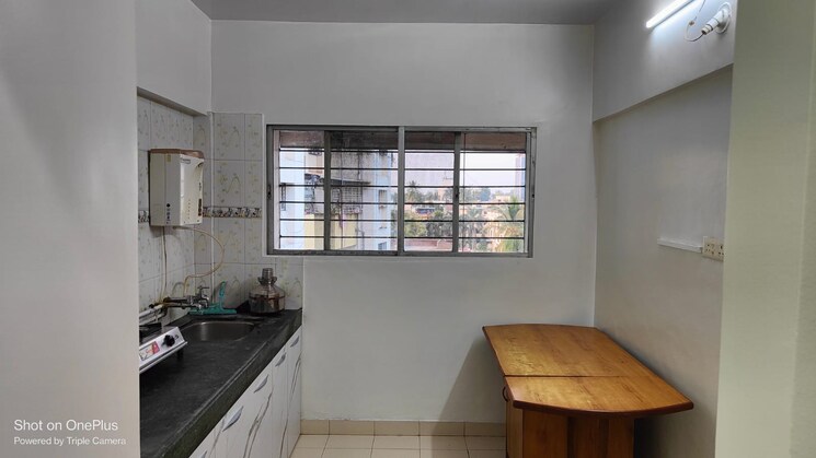 Kitchen, wadgaon sheri 2 Bedroom 986 Sq.Ft. Apartment In Wadgaon Sheri Pune 9148331