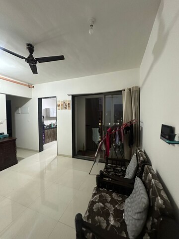 Living Room in 2 BHK Apartment at Runwal Eirene, Balkum Pada – for Rent