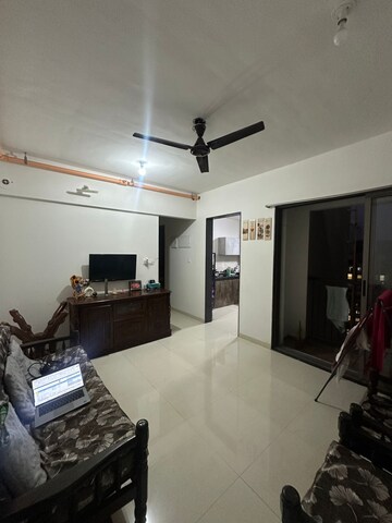 Living Room in 2 BHK Apartment at Runwal Eirene, Balkum Pada – for Rent
