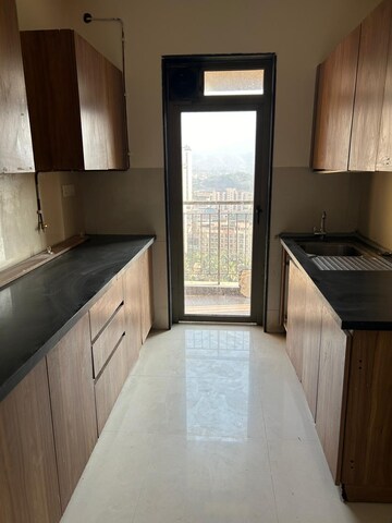 Kitchen in 3 BHK Apartment at Lodha Splendora, Ghodbunder Road – for Rent