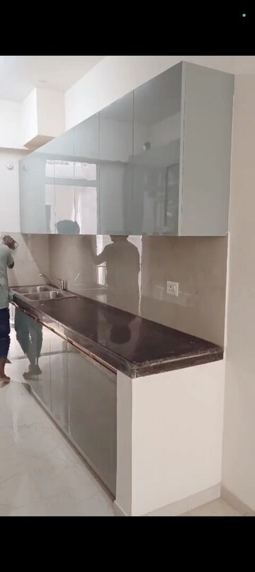 Kitchen in 2.5 BHK Apartment at Smart World Gems, Sector 89 – for Rent