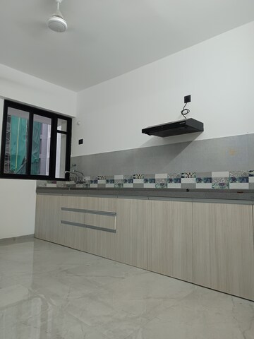 Kitchen in 2 BHK Apartment at Unique Youtopia, Kharadi – for Rent