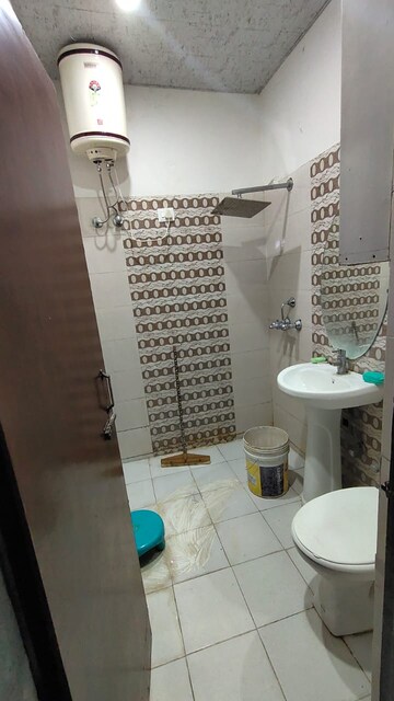 Bathroom in 2 BHK Apartment at Dhakoli – for Sale
