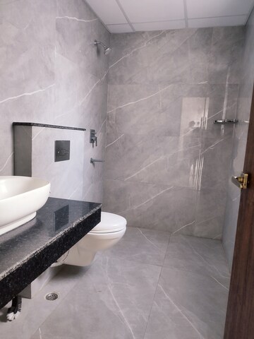 Bathroom in 2 BHK Apartment at Urban Axis Urban Woods, Sushant Golf City – for Rent